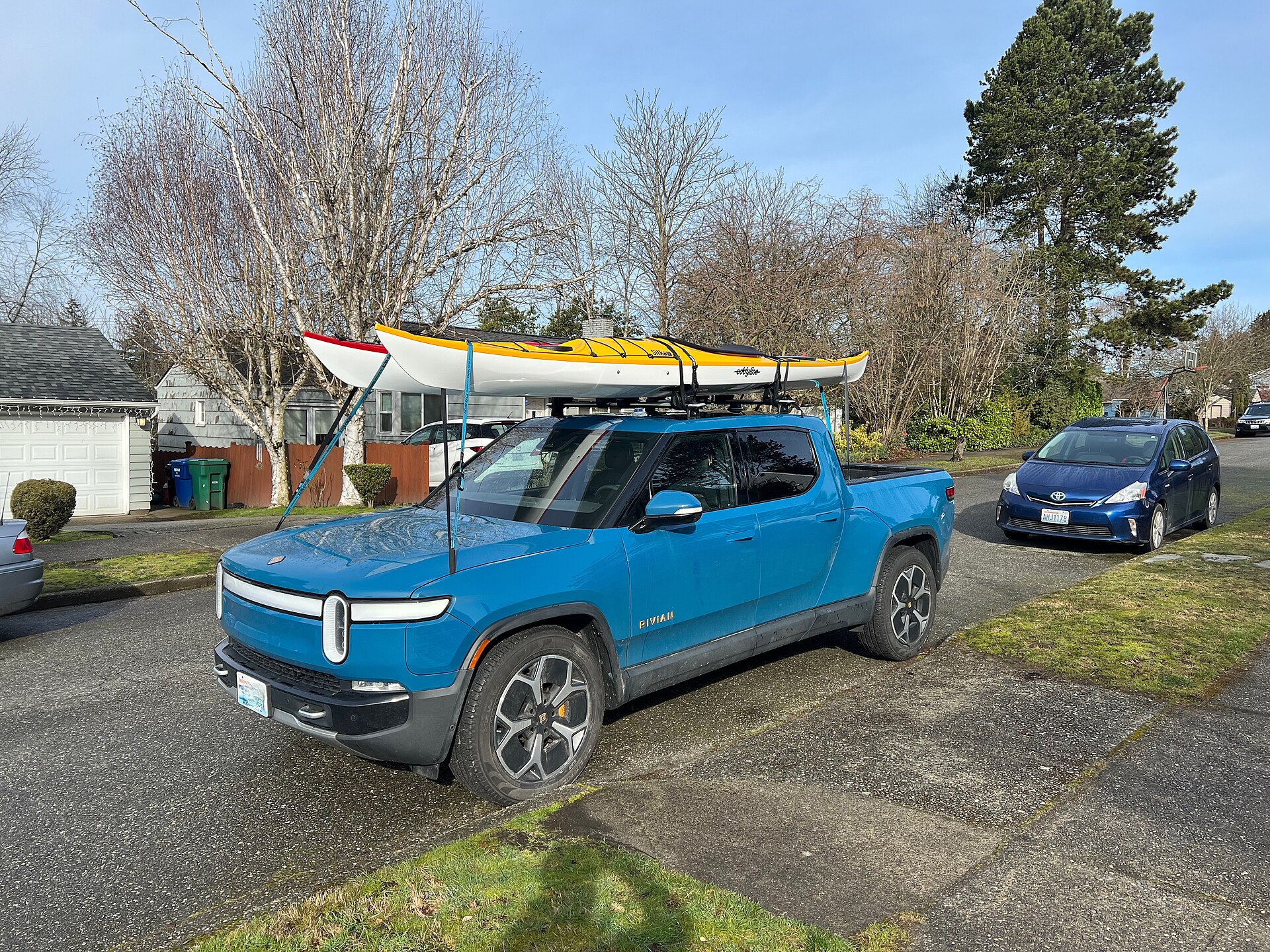 A Rivian R1T electric pickup parked outdoors
